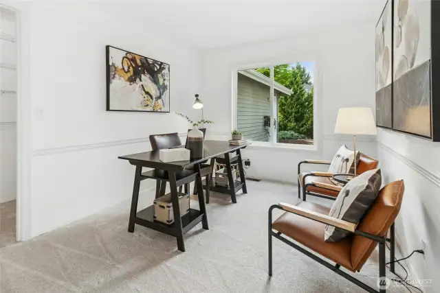Main floor den offers a quiet office retreat.