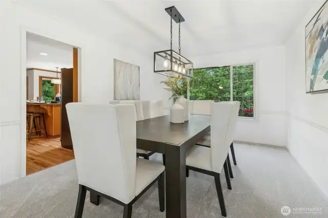 Formal, dining room with more beautiful outdoor views.