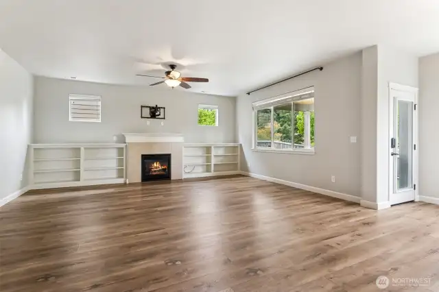 Living Room w/ Gas Fireplace & Built-ins