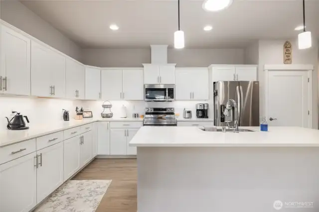 There is lots of counter space & an eating bar too.