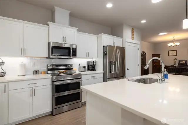 The island has an undermount sink and dishwasher.