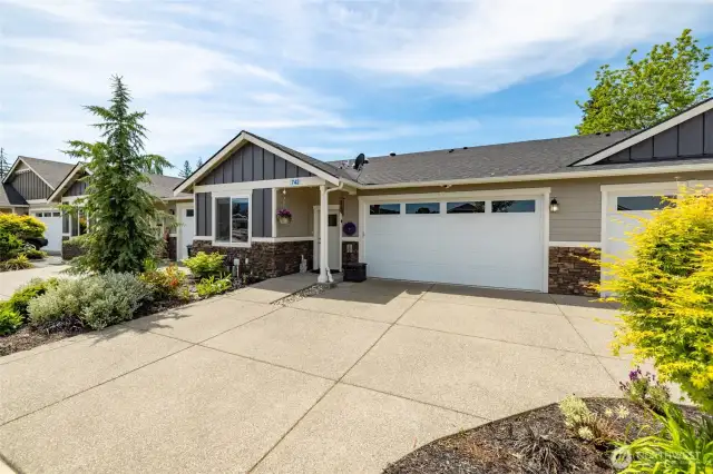 This townhome is one level and has a two car garage with lots of parking.