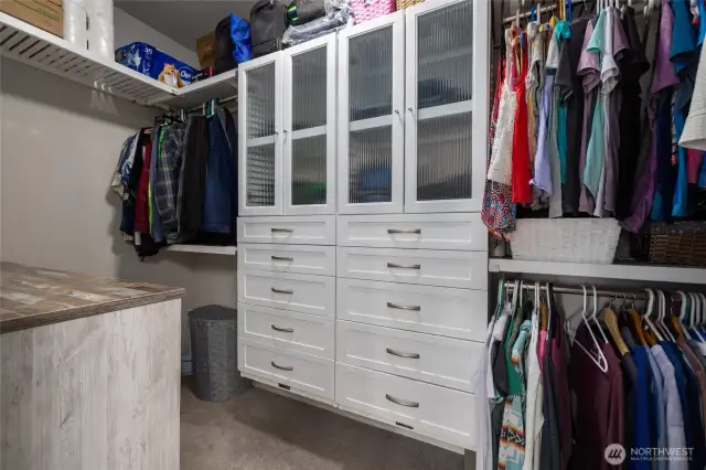 The primary walk in closet has builtins.