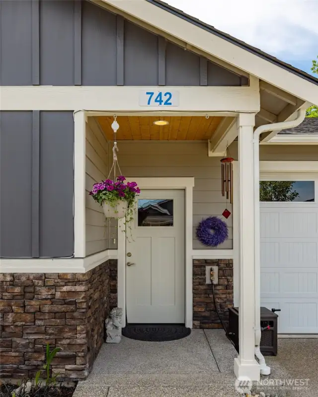 Stay dry under the covered front entry with no step!