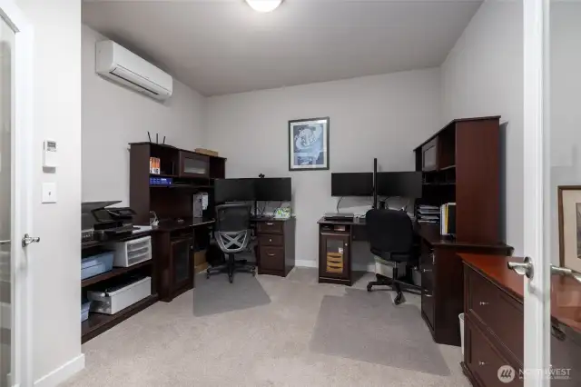 There is a den with double french doors and a solatube for natural light.