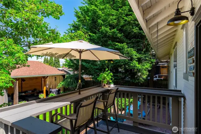 The deck off the kitchen is the perfect patio perch, overlooking the backyard and out over the magic Skagit Valley.