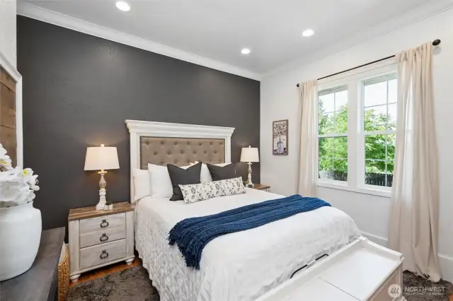 The primary bedroom is the perfect retreat. With tall windows looking out into the back yard and a spacious ensuite, you'll have everything you need! Double closets too!