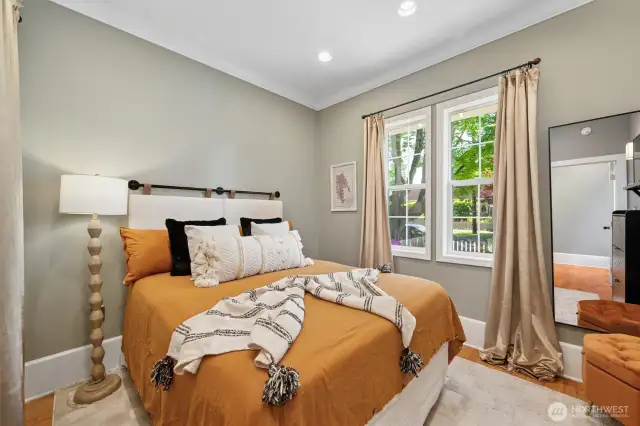 Warm & welcoming, the second bedroom is a polished and cozy space.