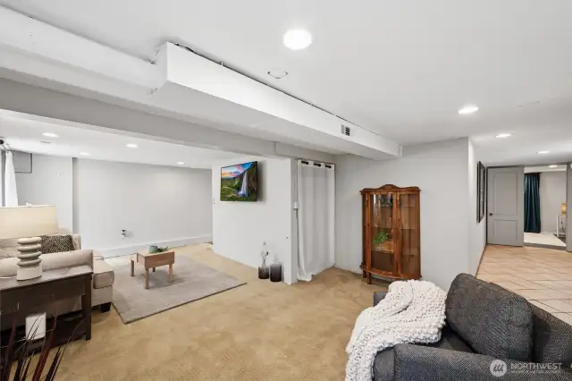 Down the hallway to the right leads to the third bedroom, which connects to the basement bathroom.