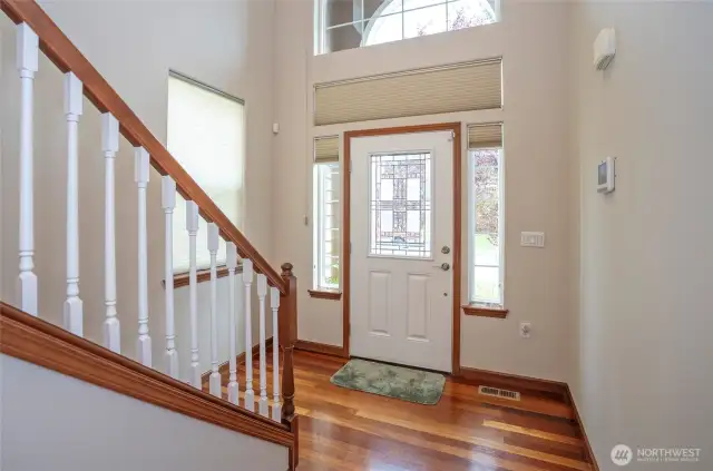 An open, light-filled entryway creates a warm welcome for your guests.