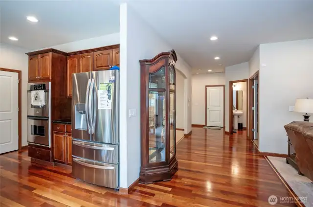 Rich Brazilian Cherry floors bring a touch of elegance and sophistication to this home.