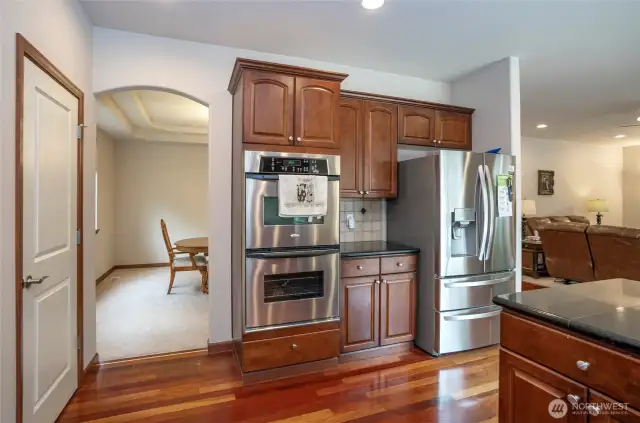 Kitchen offers a clear view into the adjoining dining area, perfect for effortless entertaining.