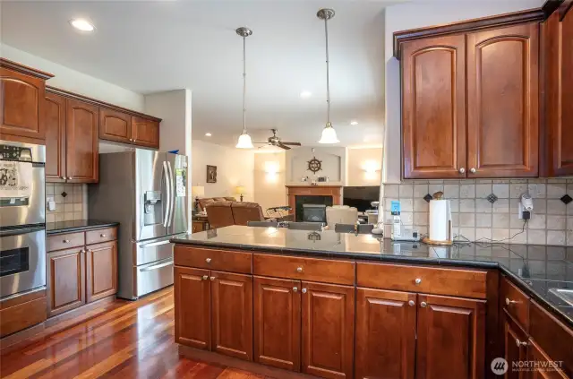 Enjoy a clear view from the kitchen into the spacious family room—perfect for staying connected while entertaining or relaxing.