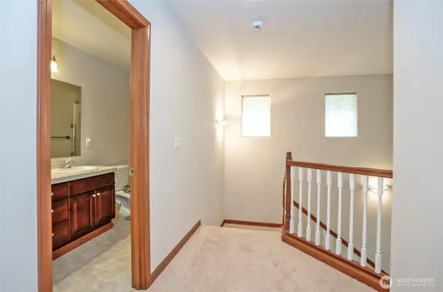 Spacious upper landing with the full guest bathroom located just to the left.