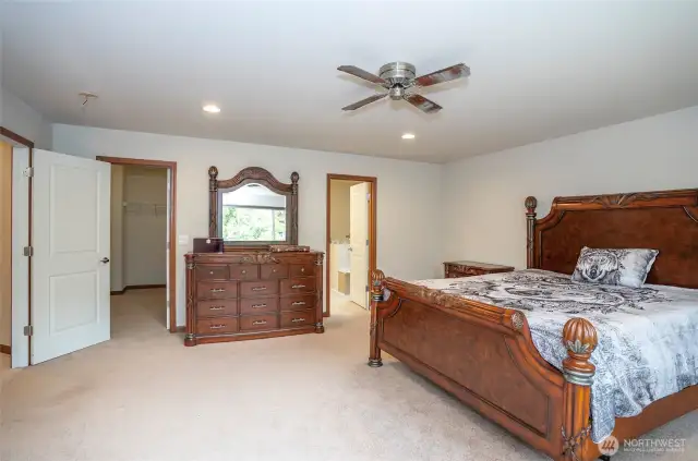 Retreat to the primary suite, complete with a luxurious en-suite and generous walk-in closet.