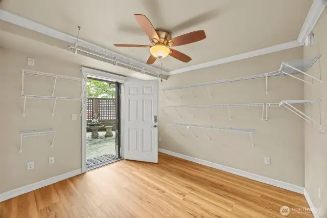 Third bedroom with door to courtyard.  Previously used as sewing room.