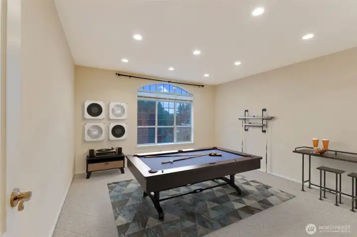 Upstairs rec room, virtually staged.