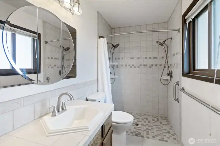 primary bathroom walk in tiled shower