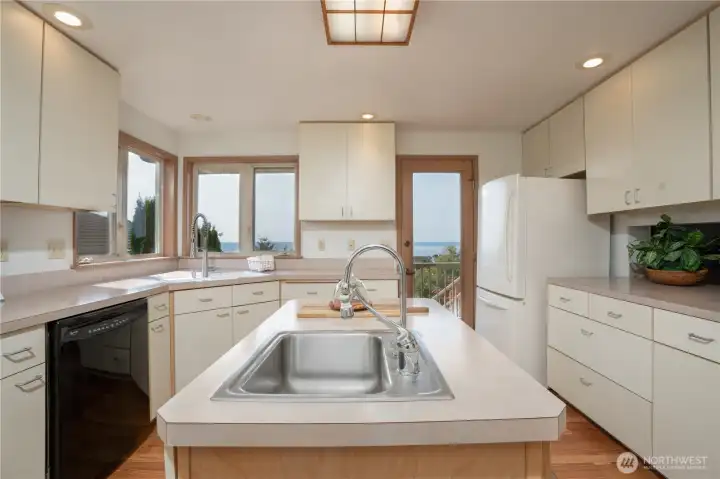 Miles of counter space. Door opens onto deck.
