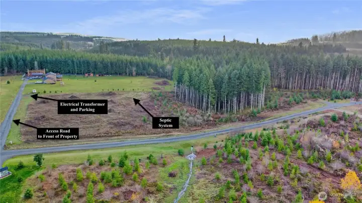 Septic, electrical, road in front of property.