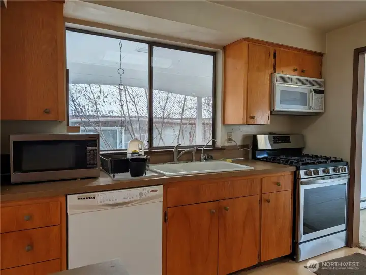 Kitchen is functional as is or ready for your updates. Welcome to #11214 34th Ave E, Tacoma WA 98446. 3200+sf, 4+ br, 3 ba, 1.1 fenced acres.