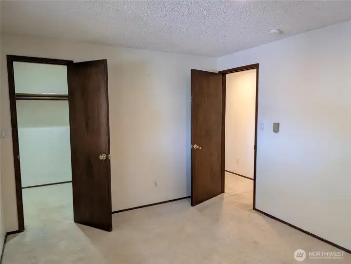 Bedroom 2. Welcome to #11214 34th Ave E, Tacoma WA 98446. 3200+sf, 4+ br, 3 ba, 1.1 fenced acres.