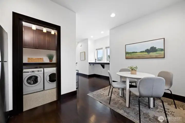 The laundry room has great space as well and access to the 1/2 bath
