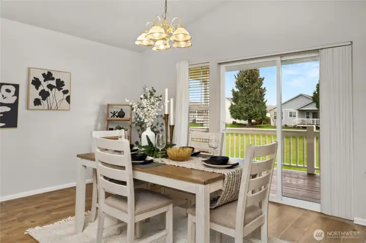 Formal dining area is convenient to the kitchen and living room.