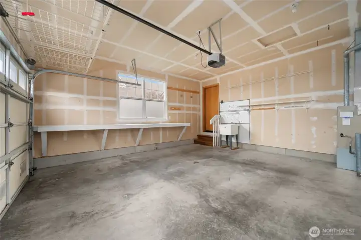 Two car garage is clean and spacious.