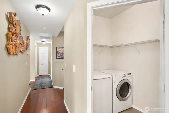 The laundry room located in the kitchen doubles as a wonderful pantry area.
