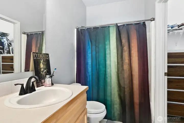 The primary suite full bathroom with walk in closet is spacious and offers easy organization!