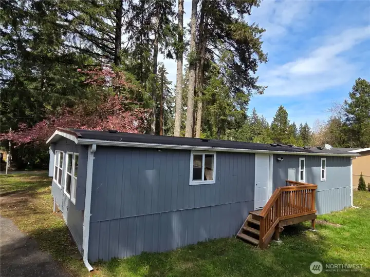 Backdoor entry also, directly off kitchen & paved driveway parking.