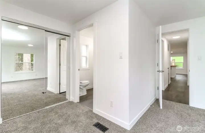 Primary has full bath & double mirrored closets.