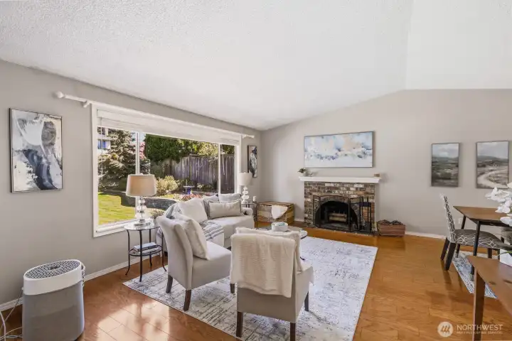 Cozy fireplace and easy care hardwood floors.