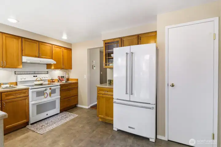 Well designed functional kitchen with pantry.