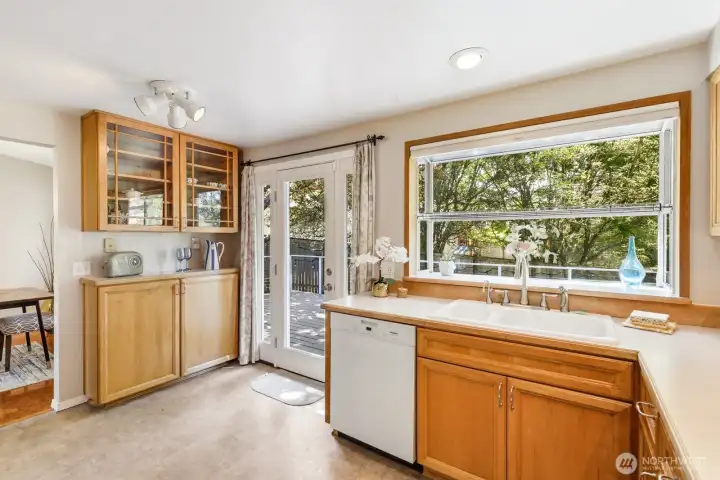 Custom cabinet can work as a butler's pantry.