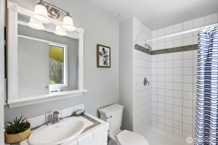The 3/4 bath off the primary bedroom.