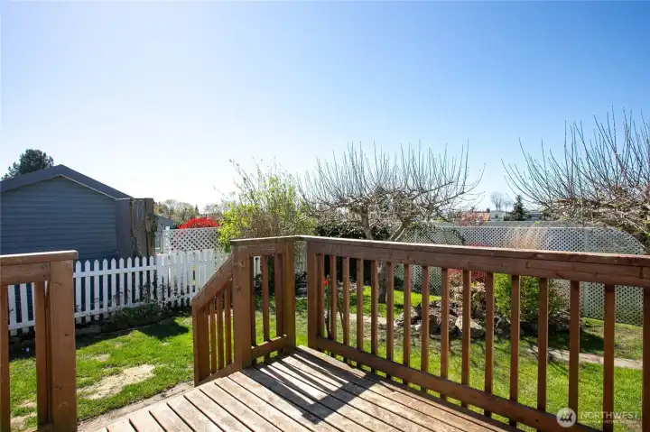 Can access yard from back of deck or through fence.