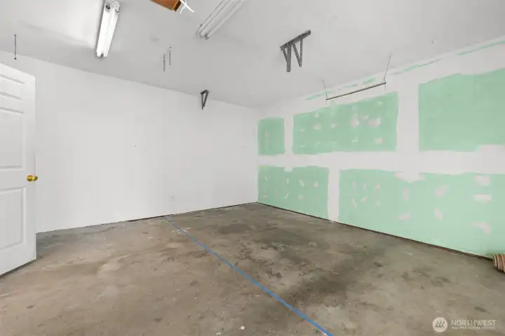 Garage was converted to a flex room, easy to remove drywall and make it a garage again