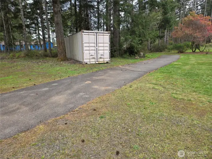 Shipping container & Travel Trailers will all be moved upon closing, does not go with the property