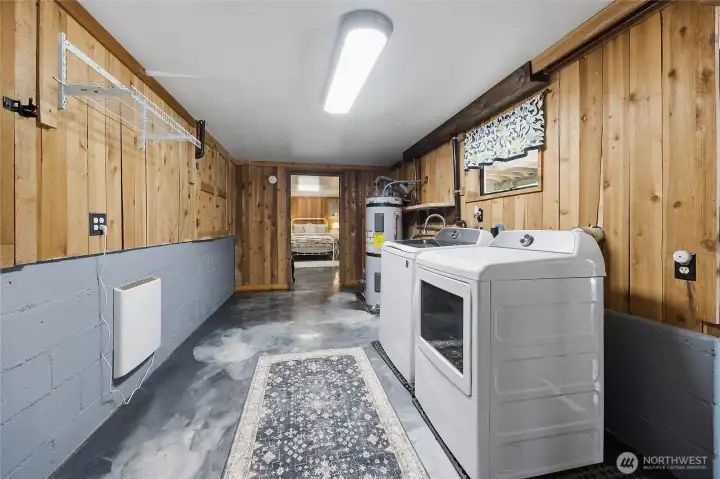 Lower level washer and dryer. Water heater is located in basement.