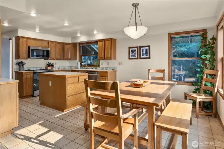 Dining room and Kitchen with stainless steel appliances.