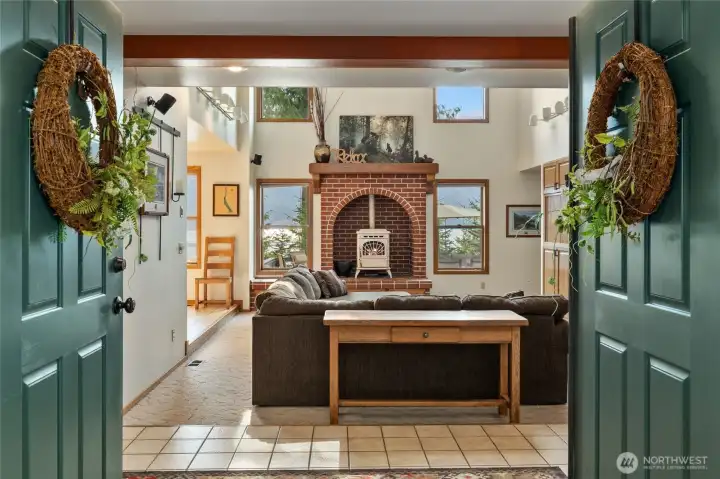 Walking through the front door.