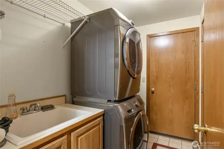 Mud/laundry room with an exterior door for easy lake clean up!