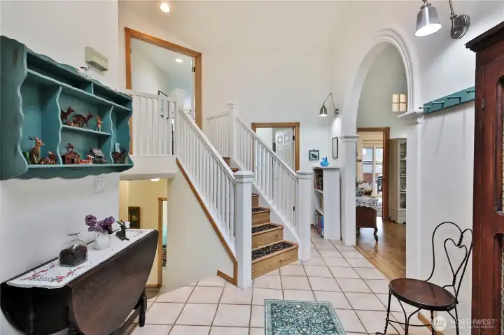 A grand feeling foyer. A space to stop and greet guests.