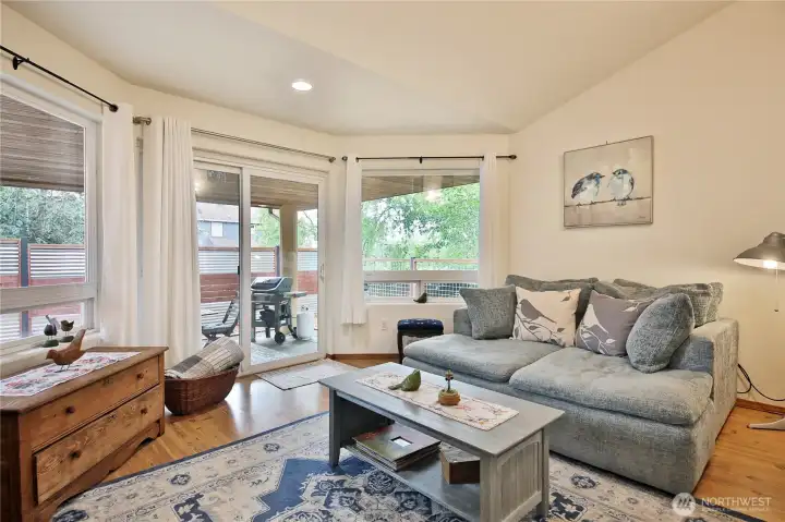 The family room is in the back of the home. A sliding door leads to the fully fenced back yard.
