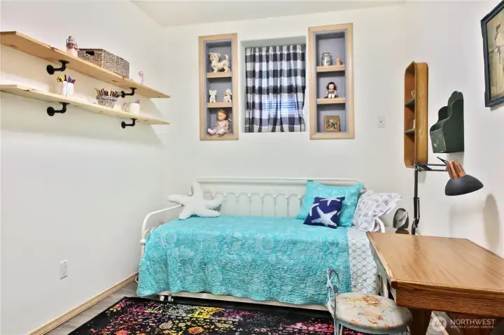 Bedroom two, notice the tall ceilings and built ins.