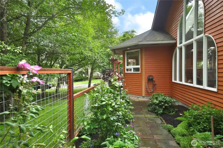 Paths lead around the property, connecting it seamlessly.