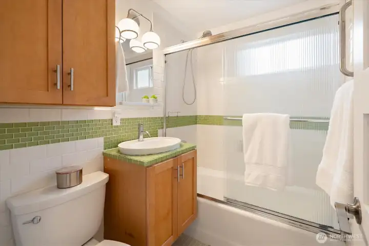 The main floor bathroom is perfectly situated between the two bedrooms.