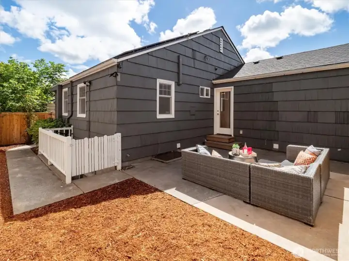 The backyard is fully fenced and is perfect for BBQ and outside time.